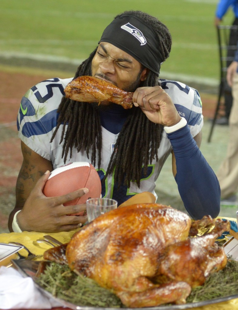 Nov 27, 2014; Santa Clara, CA, USA; Seattle Seahawks cornerback Richard Sherman (25) eats a turkey leg after the game against the San Francisco 49ers at Levi's Stadium.The Seahawks defeated the 49ers 19-3 in the Thanksgiving Day game. Mandatory Credit: Kirby Lee-USA TODAY Sports ORG XMIT: USATSI-180368 ORIG FILE ID: 20141127_ter_al2_042.jpg